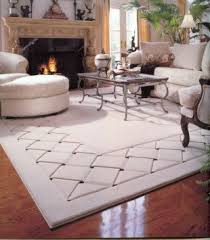 Close-up of an area rug showing different fibers and patterns, highlighting rug textures and colors.