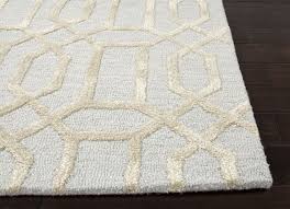 Close-up of a custom area rug showing different pile heights and fiber textures