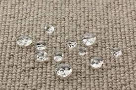 Professional PFAS-free fabric protection applied by Alec's Carpet & Upholstery Cleaning, showing water beading on a high-quality textile surface in a Greater Boston home