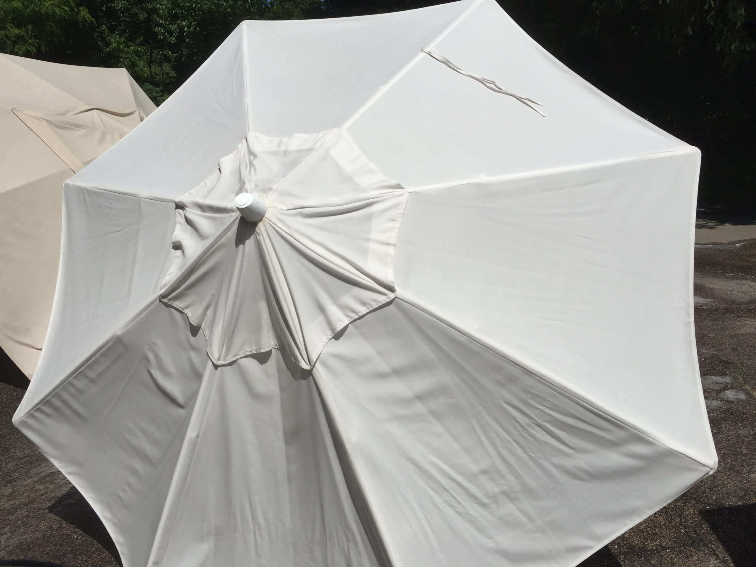 Outdoor patio umbrella after professional cleaning.